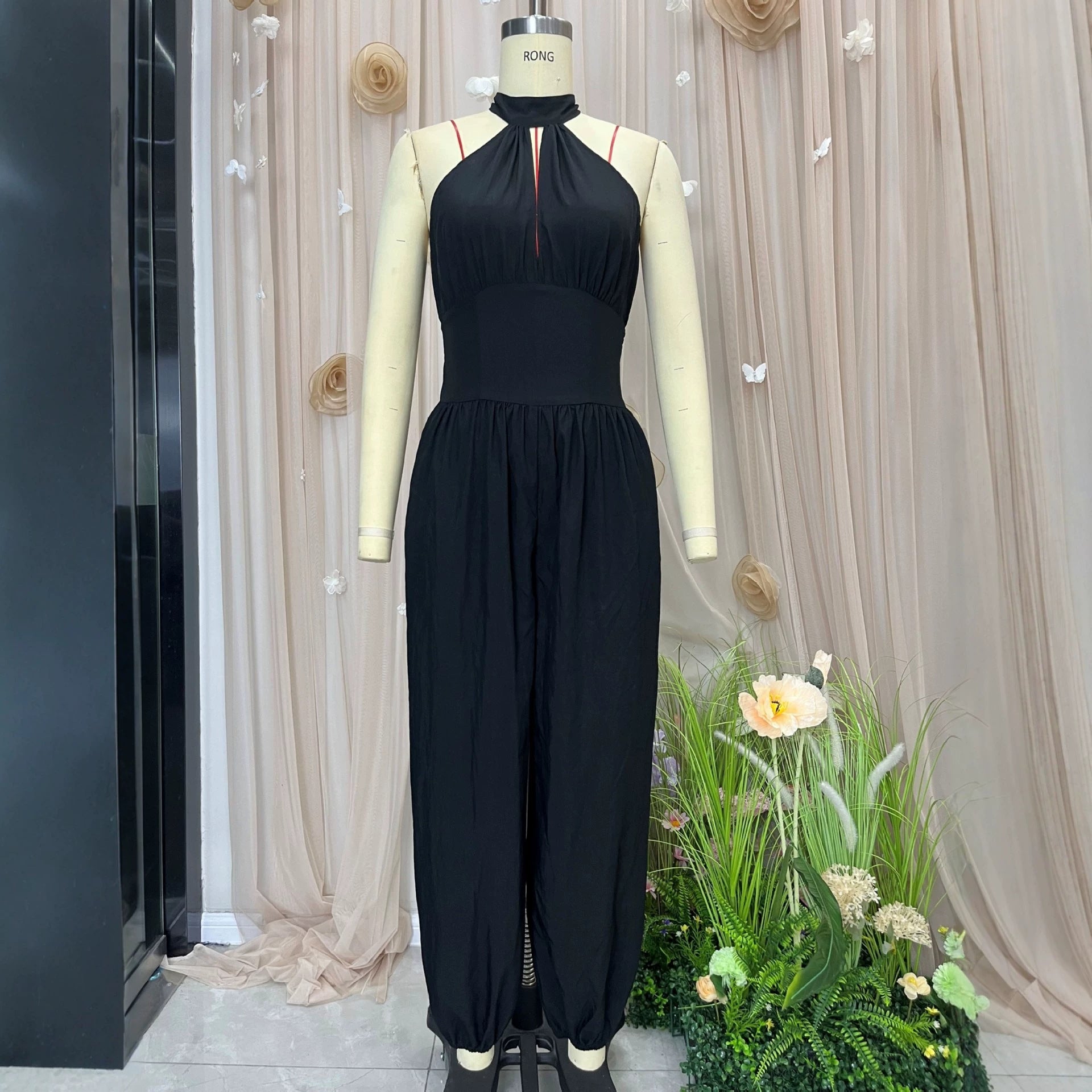 Mouwloze halternek rugvrije jumpsuit met hoge taille