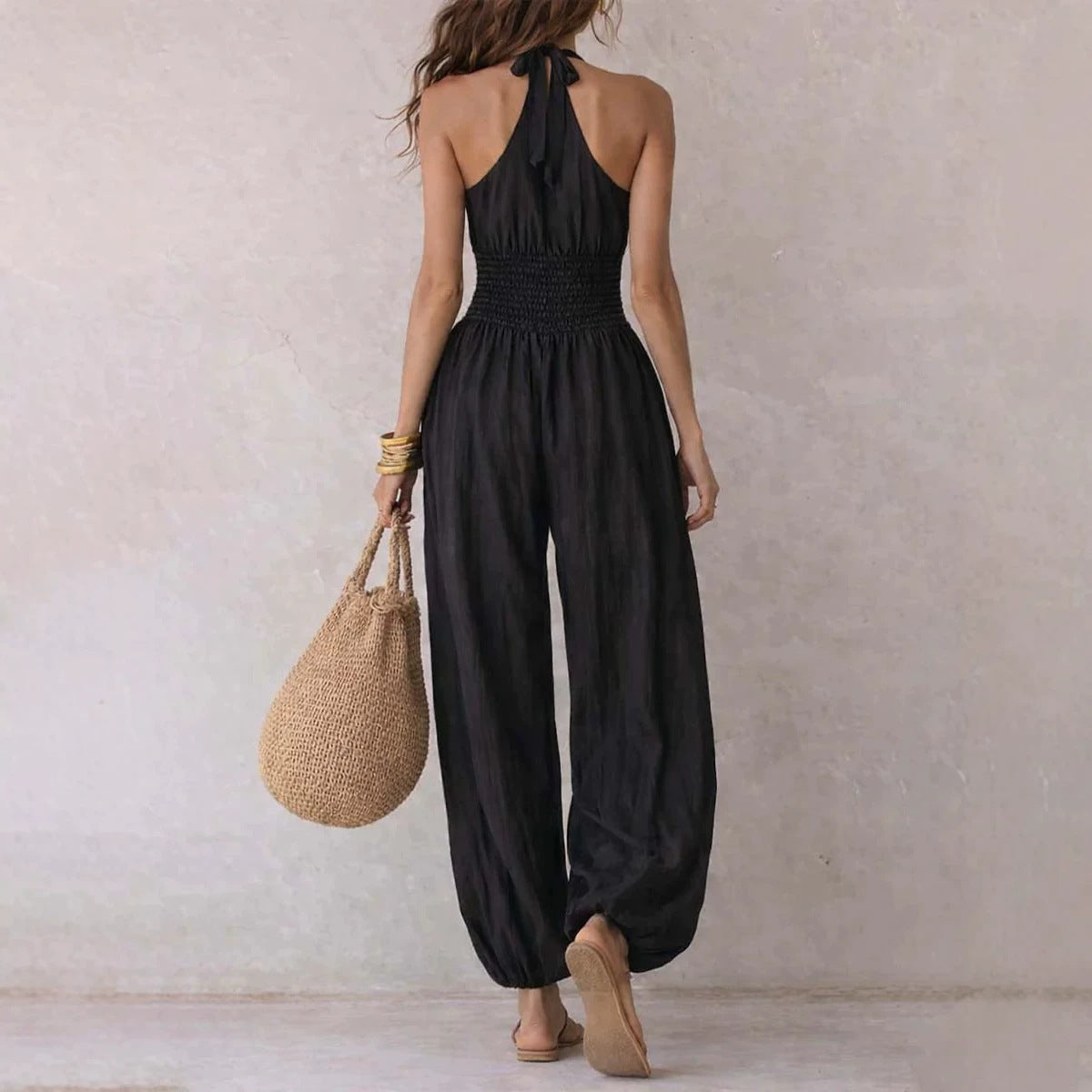 Mouwloze halternek rugvrije jumpsuit met hoge taille