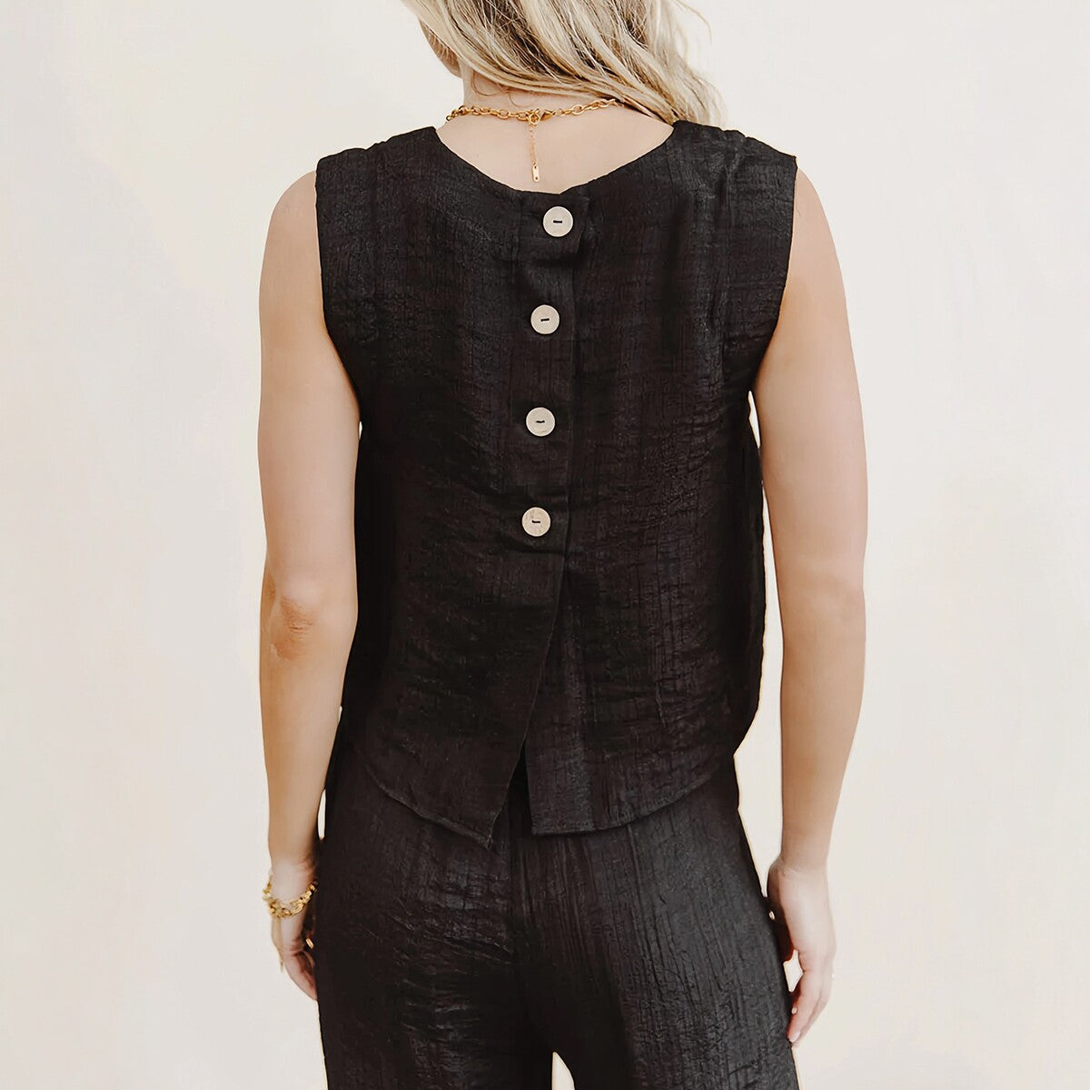 Elara mouwloze set met wijde pijpen
